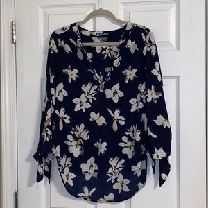 Navy blouse with flower detailing